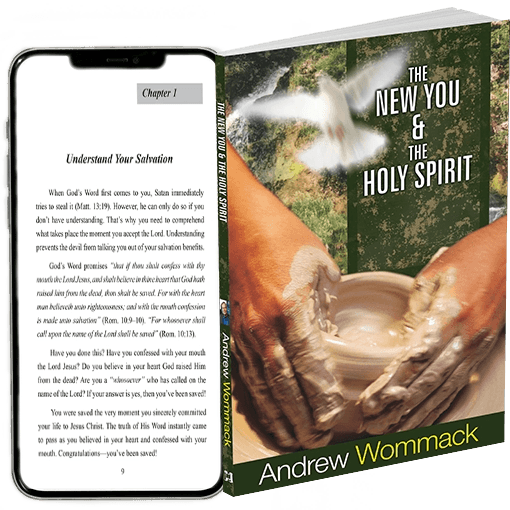 The New You & The Holy Spirit by Andrew Wommack, as a printed book beside the same teaching open on a phone